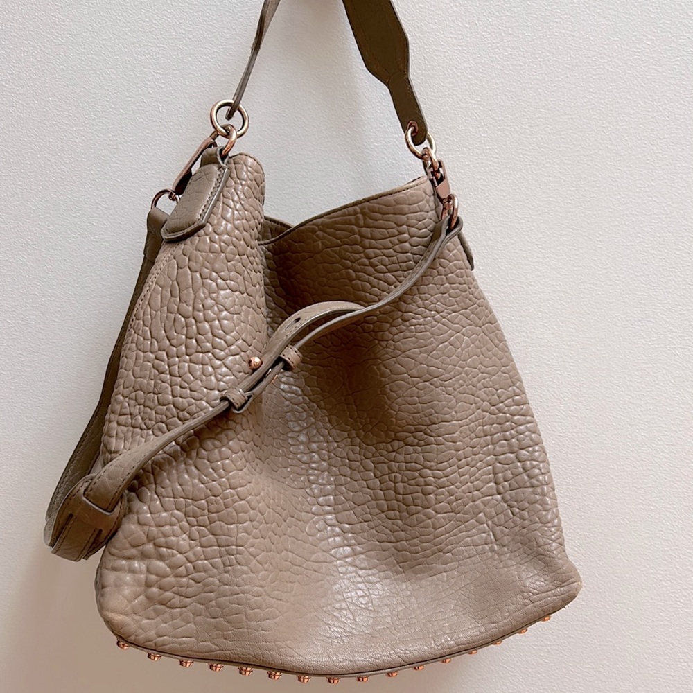 Alexander Wang taupe leather handbag with rose gold detailing including studs